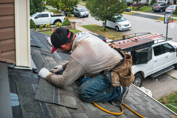 Professional Roof Replacement technician working in Hampton, CT